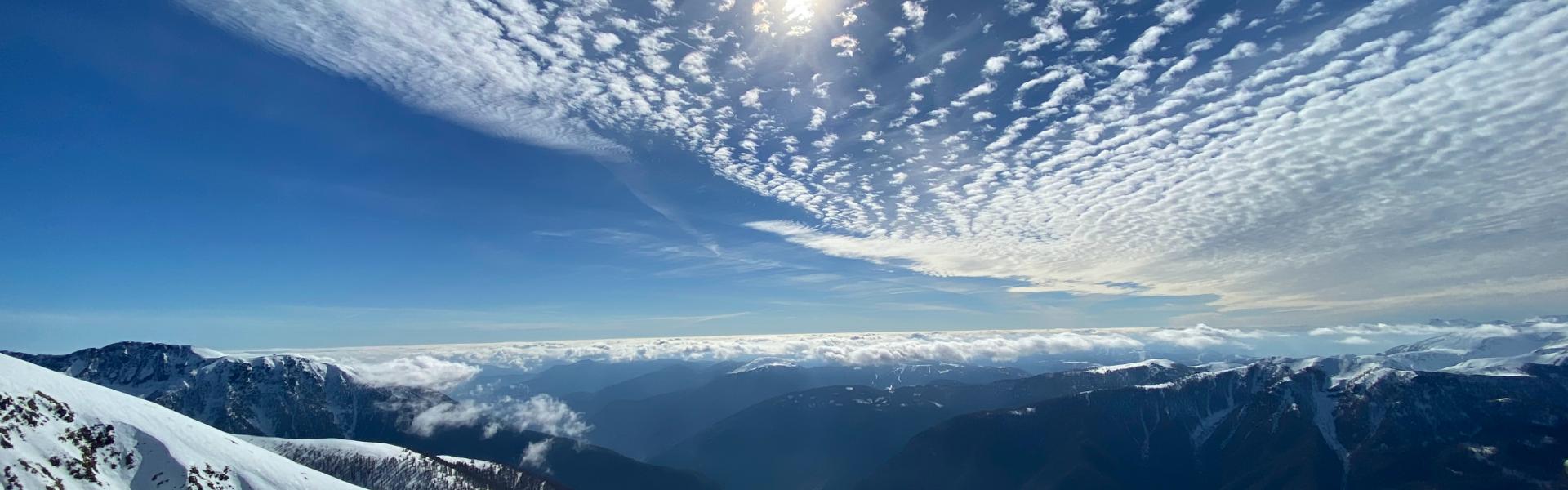 snow covered mountain under blue sky during daytime