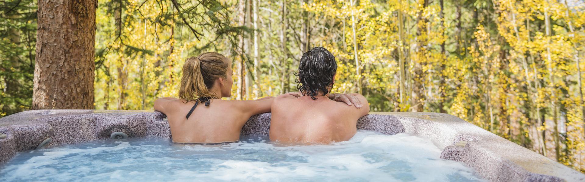People in a hot tub in a holiday cottage
