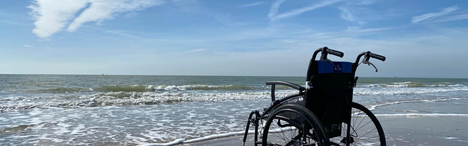 black and gray wheelchair on beach during daytime