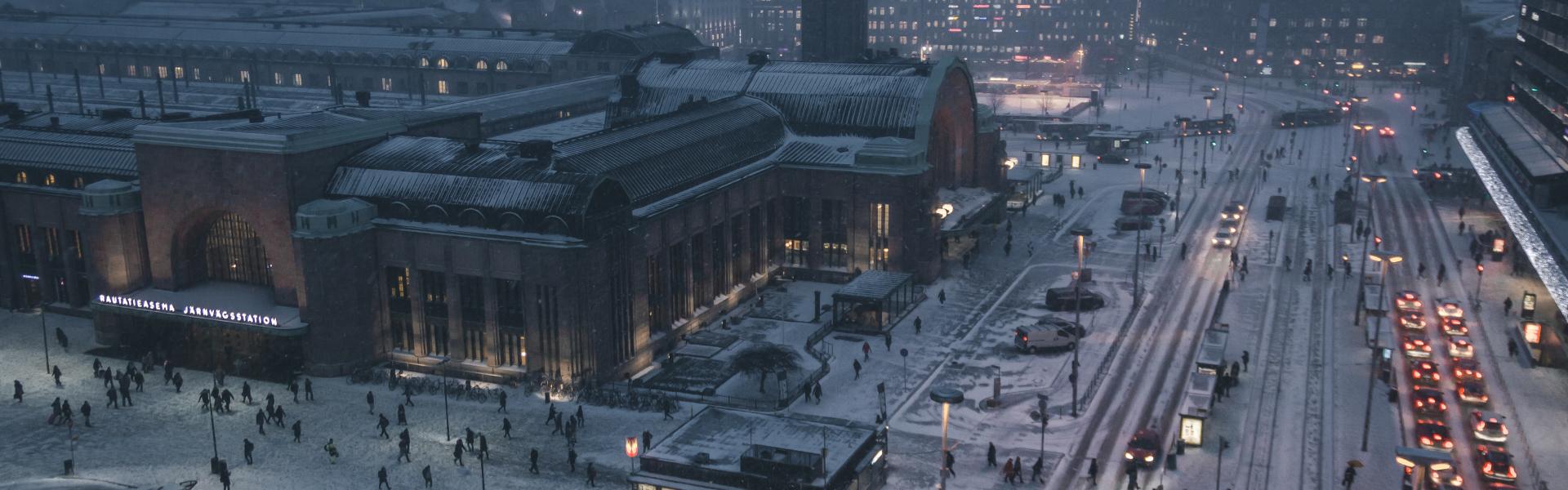 aerial photography of street at night covered with snow