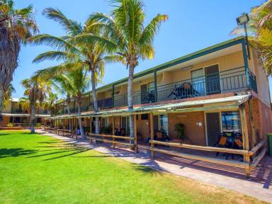 Unwind At a Holiday Home in the Paradise of Coral Bay - HomeToGo